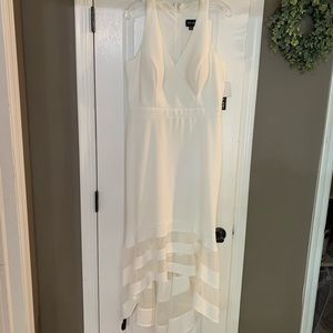 Xscape Manhattan dress. Size 14. Never worn but minor mark shown in picture.